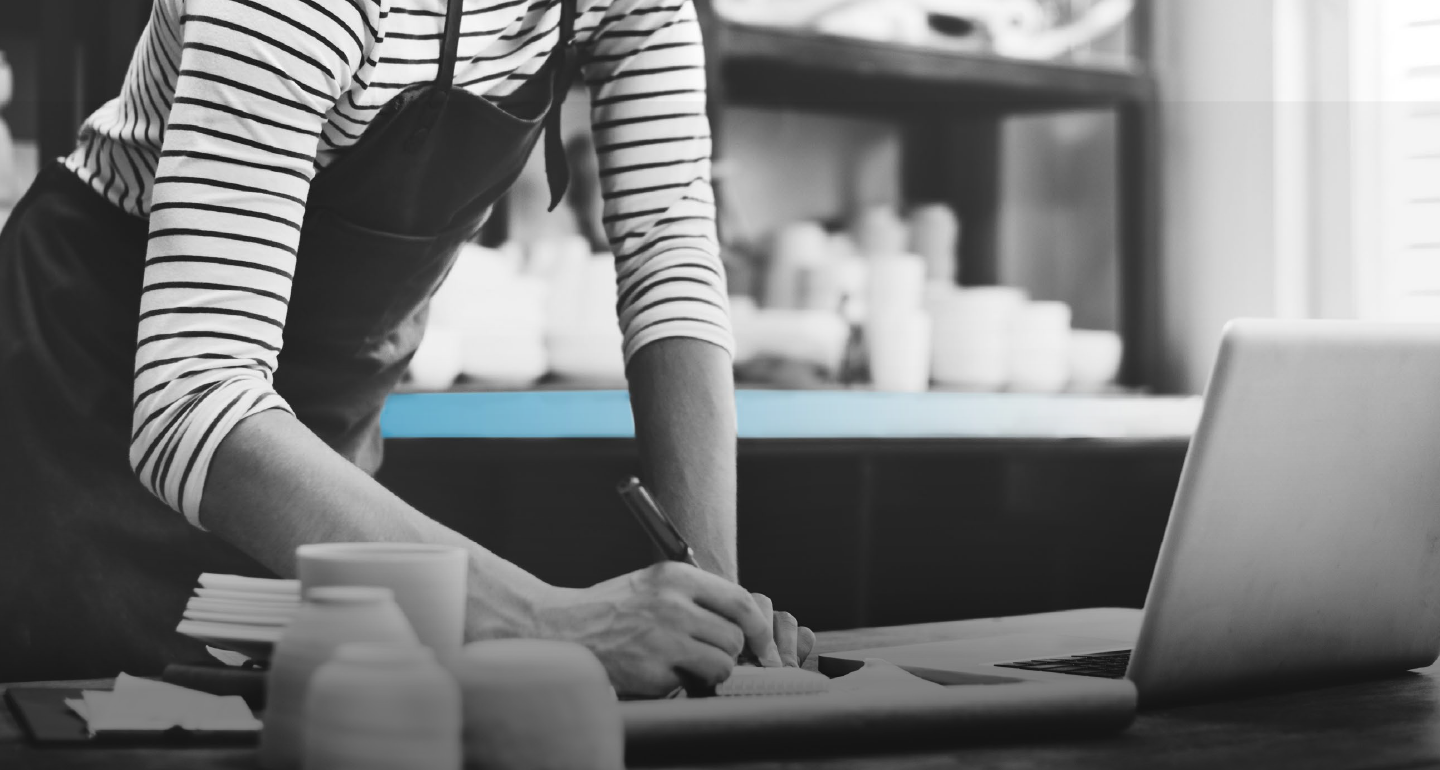 Happy couple reviewing documents